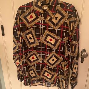 Equipment brand 100% silk women’s button down shirt. Excellent condition.